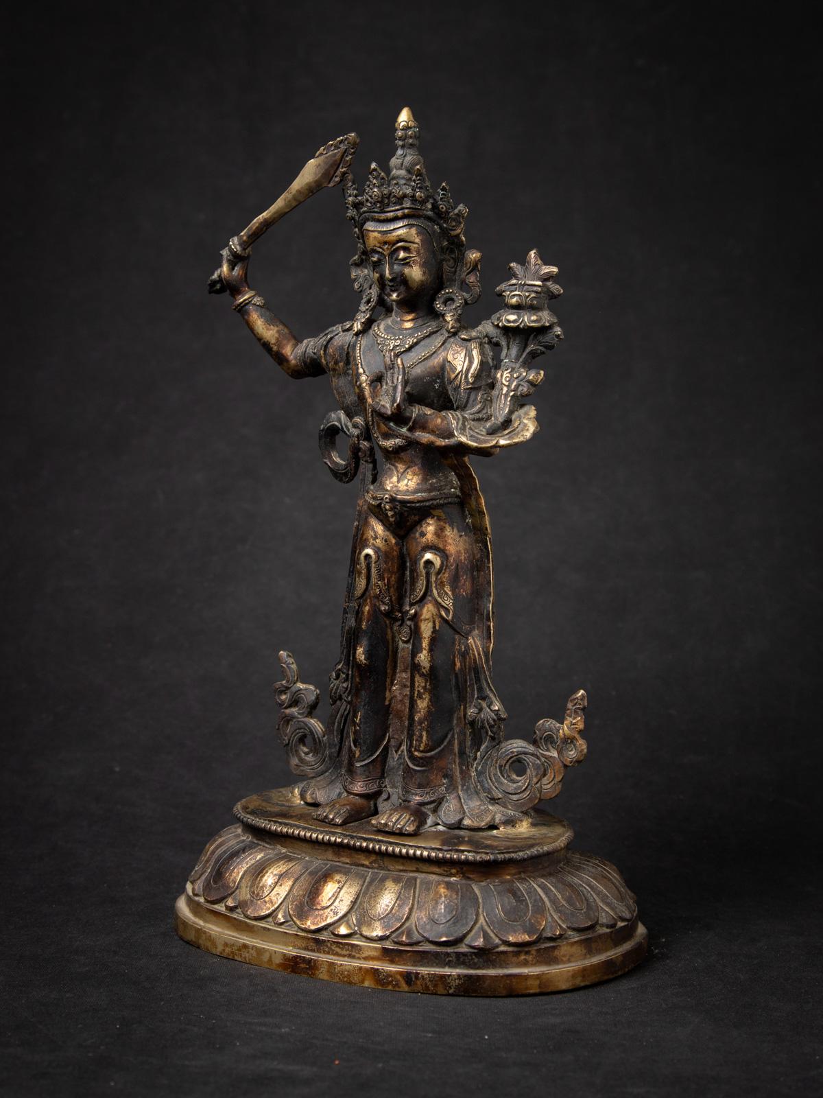 Old bronze Nepali Manjushri statue
Material : bronze
33,4 cm high
20,1 cm wide and 14,9 cm deep
Early 20th century
Weight: 2,74 kgs
Originating from Nepal
Nr: 3854