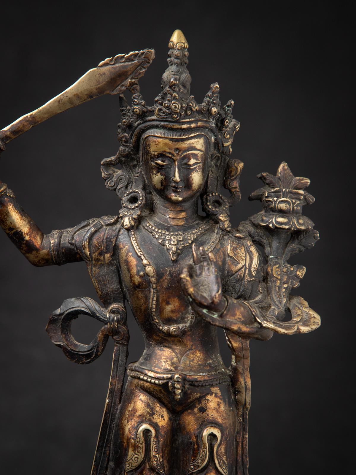 20th Century Early 20th century Old bronze Nepali Manjushri statue