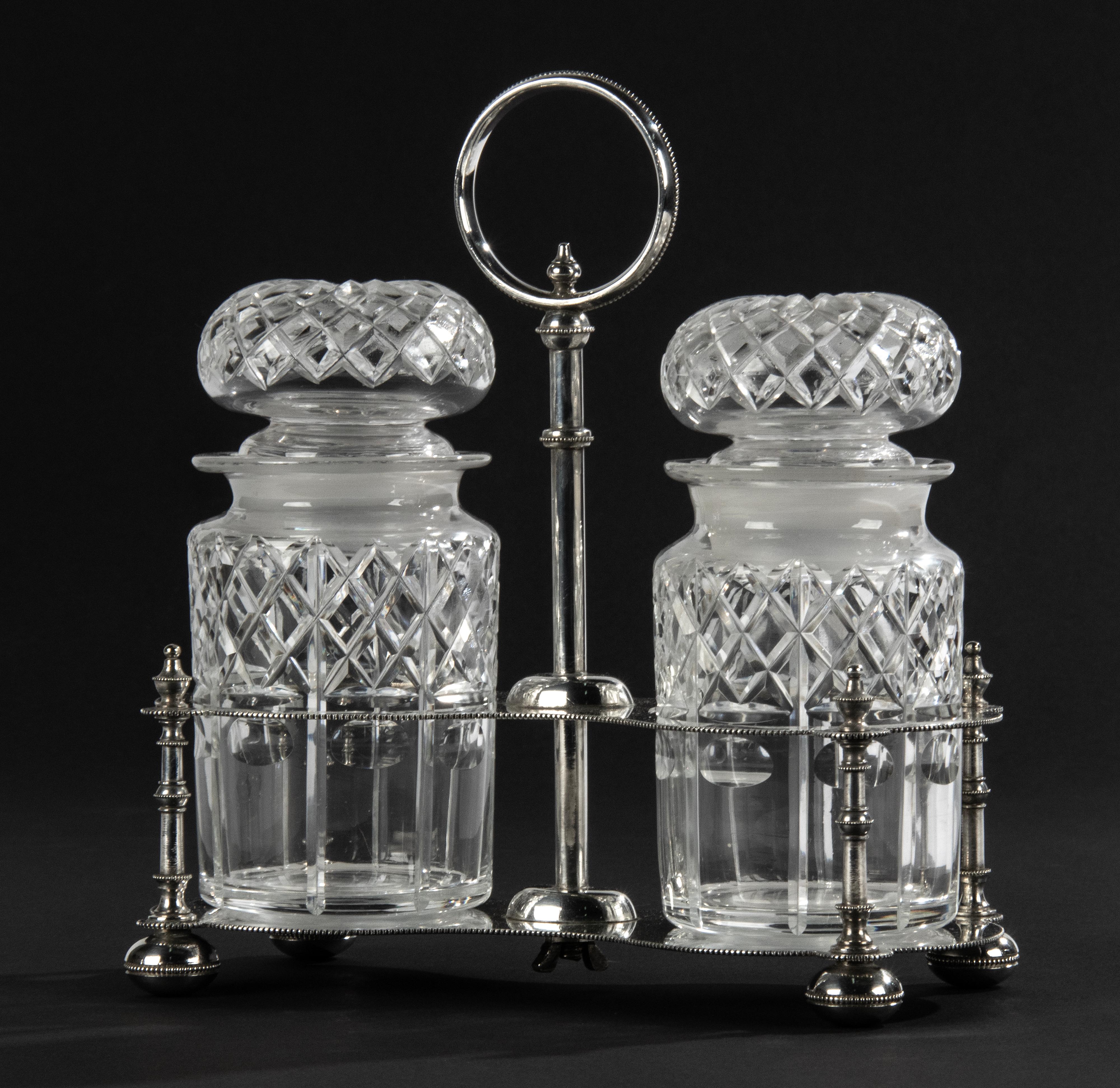Beautiful silver plated server for pickles or jam.
The stand is made of Sheffield plate, with markings on the bottom. The crystal pots are beautifully decorated with fantasy carvings. The pots are 16 cm tall and Ø8 cm.
The whole is in good and