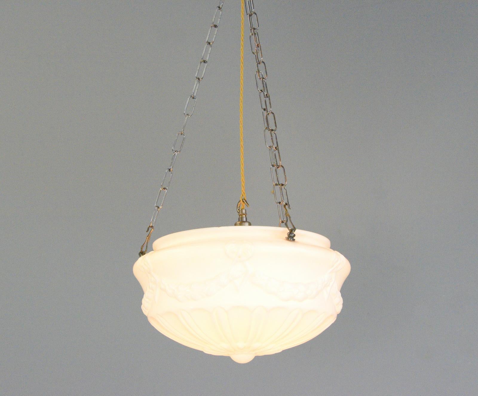 Early 20th century Opaline Hallway Light circa 1910

- Molded opaline glass diffuser
- Copper chain and bulb holder
- Original matching ceiling rose
- Takes E27 fitting bulbs
- English ~ 1910
- 37cm wide x 19cm tall 
- Up to 150cm drop from