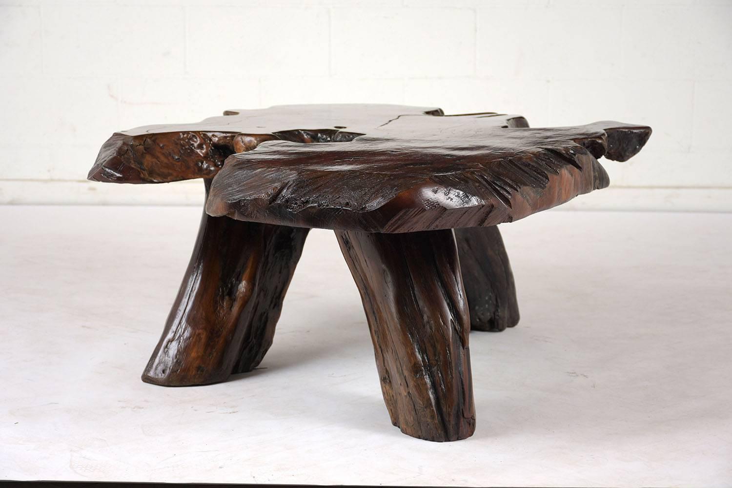 This 1930s Art Nouveau Coffee Table is made from a free form tree root stained in a rich walnut color with a lacquered finish. This Coffee Table is stunning, sturdy, and ready to be used in any home for years to come.