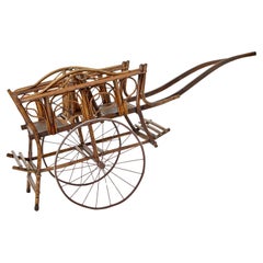 Early 20th century oriental bamboo 2 seat child carriage