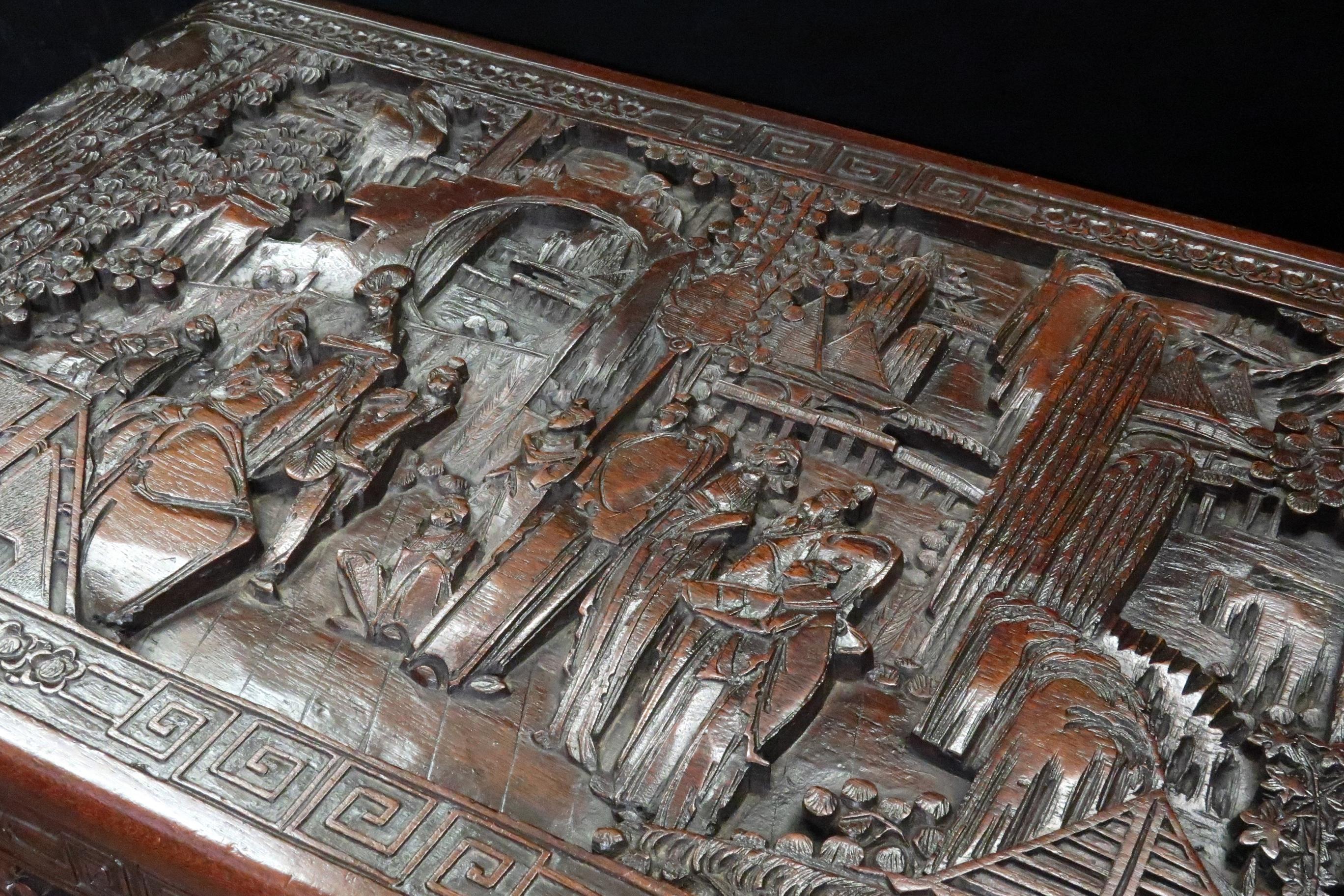 Hand-Carved Early 20th Century Oriental Oval Shaped Camphor Wood and Teak Carved Chest For Sale