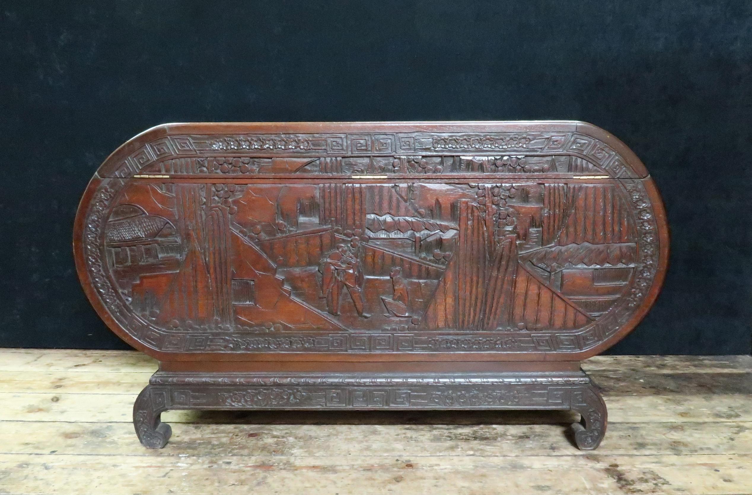 Early 20th Century Oriental Oval Shaped Camphor Wood and Teak Carved Chest For Sale 4