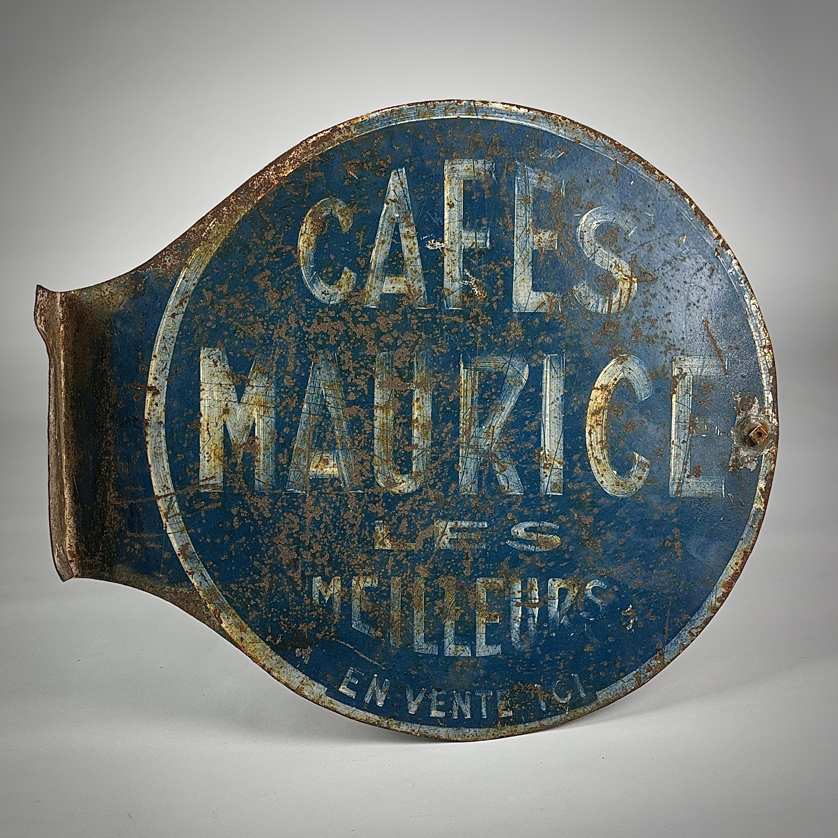 Original, untouched double sided trade sign for Cafe Maurice.

Wonderful Blue original Paint, wall mounted. One side with slightly more wear and weathering than the other. Excellent typography. 

Original and Untouched.

France, Circa 1930.