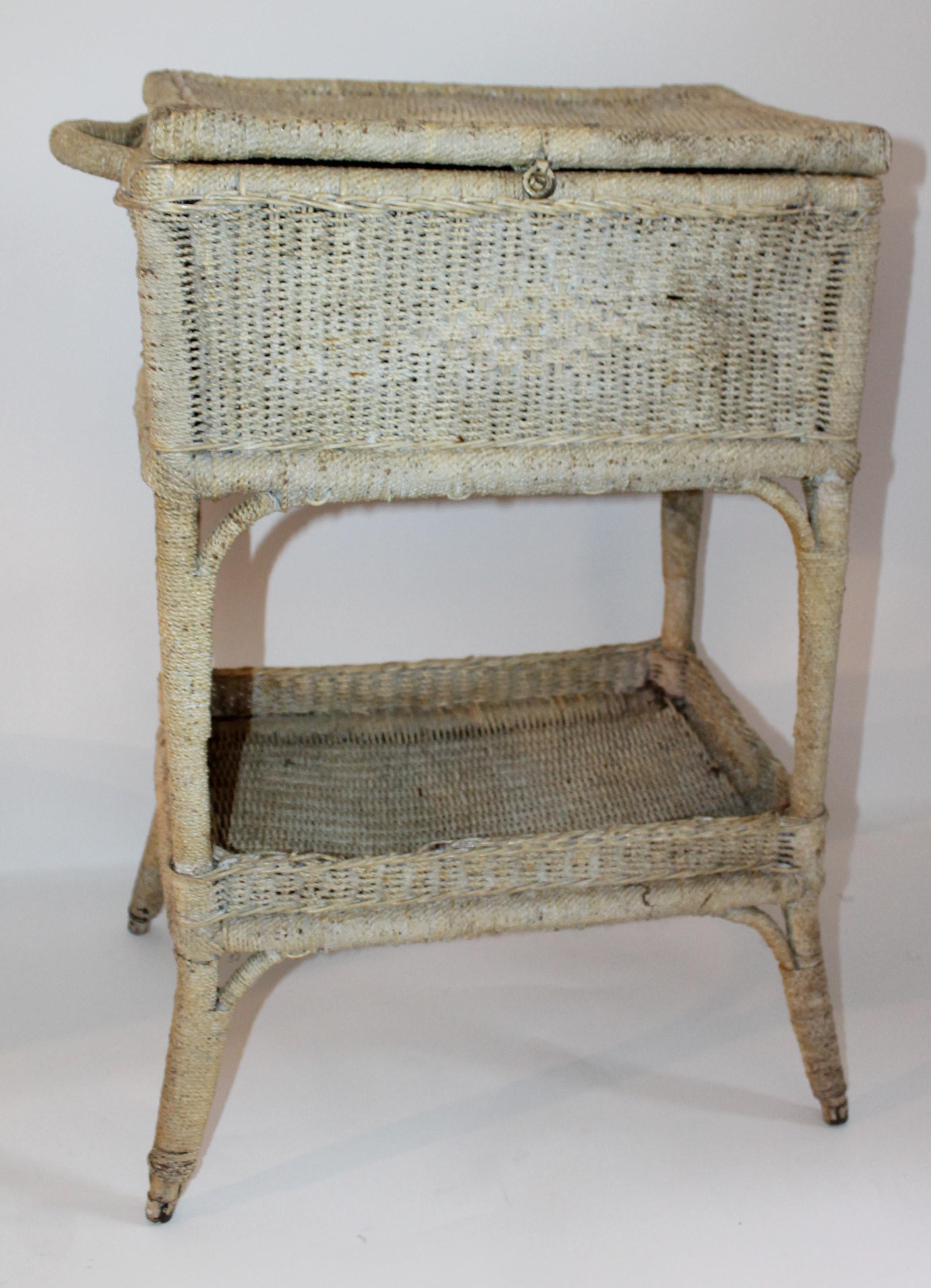 This fine handwoven and original creamy yellow sea grass side table or end table is in good condition and very sturdy. The top has a slight dip in it from age and use. It looks like it was used as a sewing basket stand. Fantastic side table on a