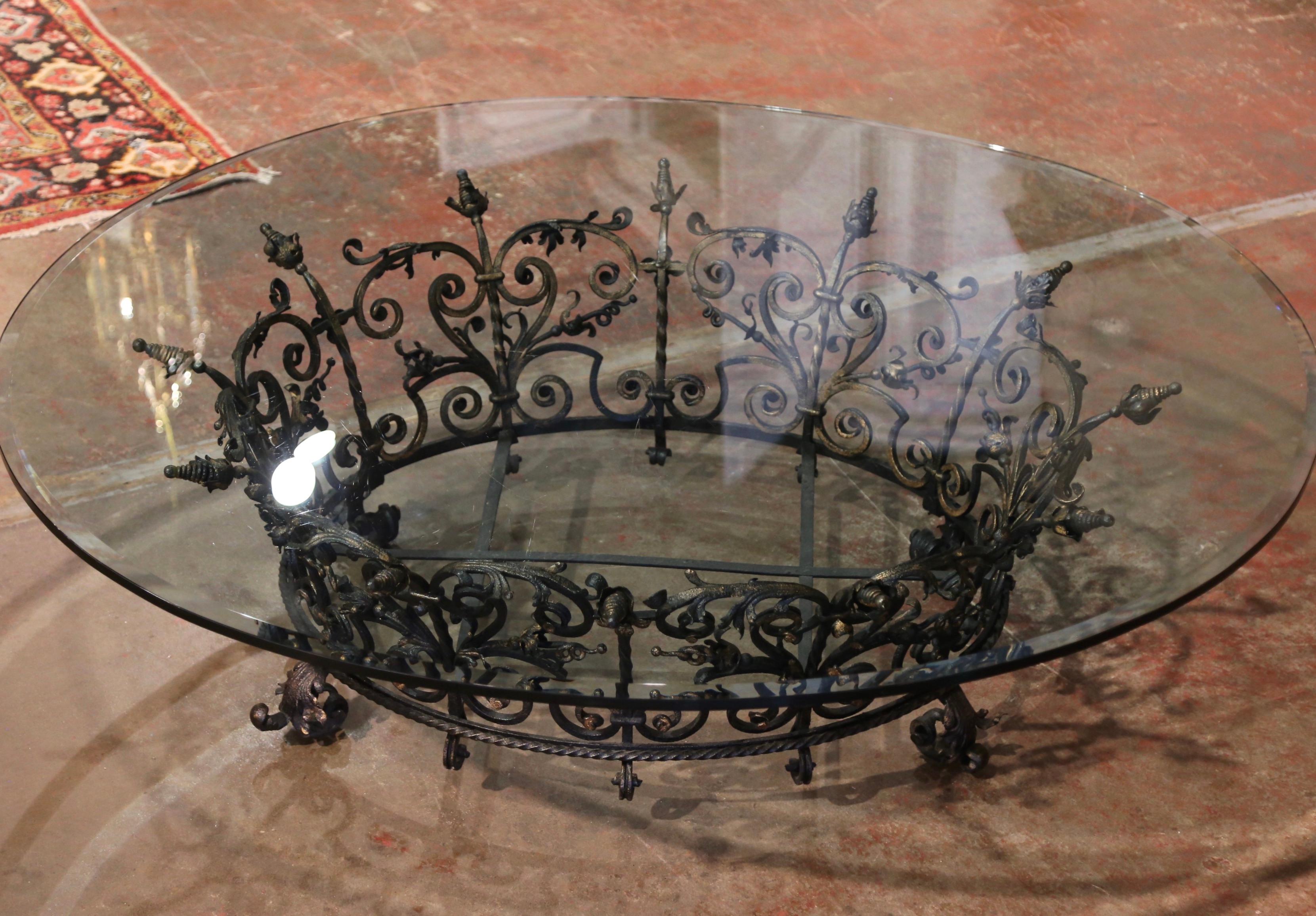 black wrought iron coffee table with glass top