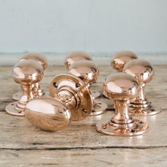 Early 20th Century Oval Rose Brass Door Knobs