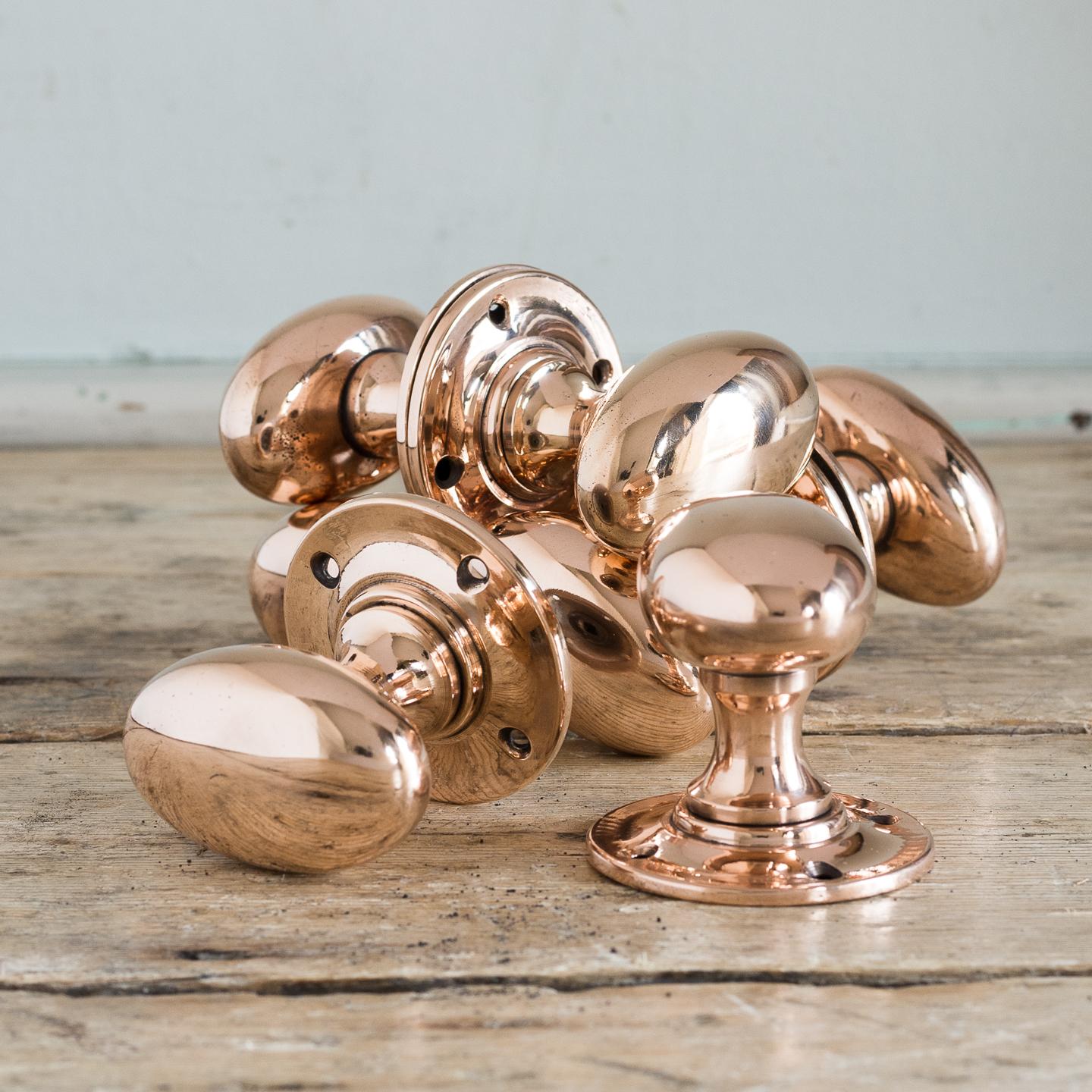 British Early 20th Century Oval Rose Brass Door Knobs