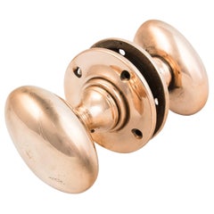 Early 20th Century Oval Rose Brass Door Knobs