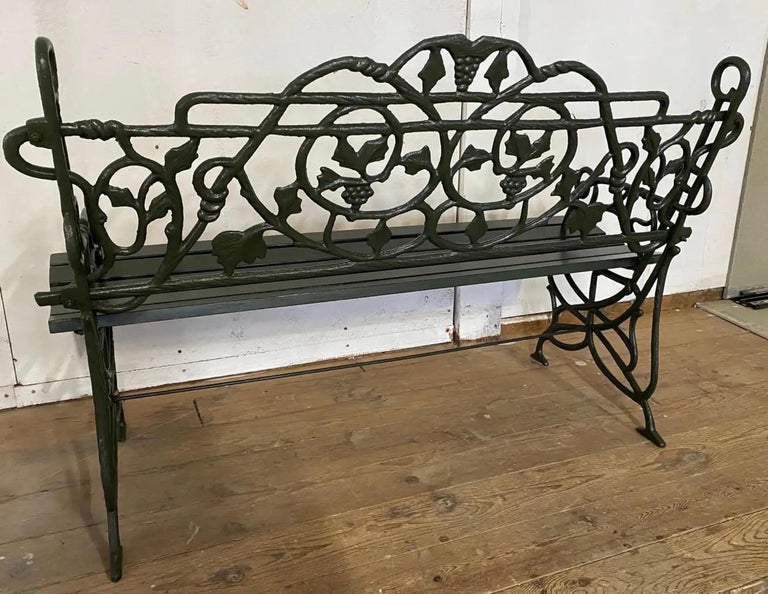 Early 20th Century Painted Cast Iron Garden Bench with Vine Motif In Good Condition For Sale In Great Barrington, MA