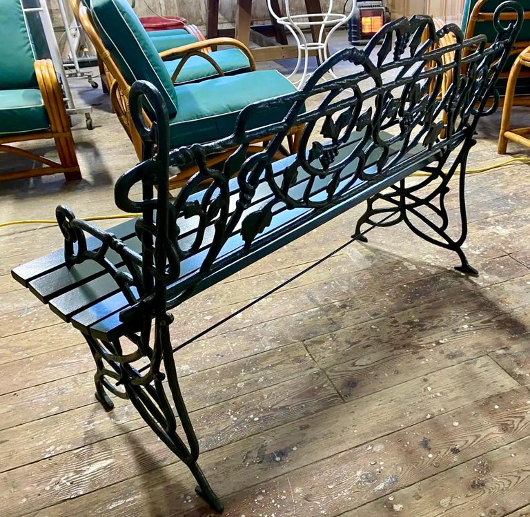 Early 20th Century Painted Cast Iron Garden Bench with Vine Motif For Sale 1