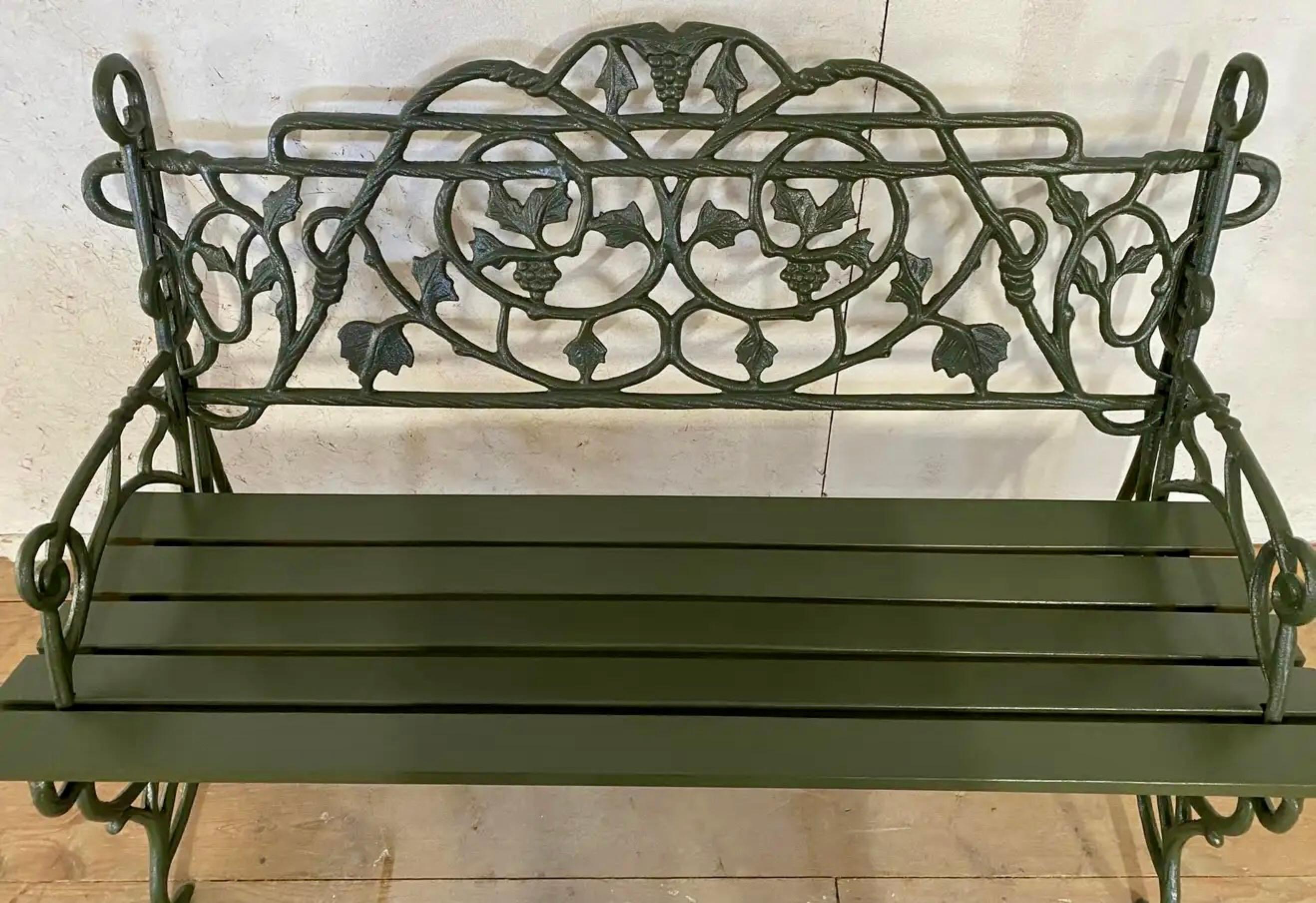 Early 20th Century Painted Cast Iron Garden Bench with Vine Motif In Good Condition In Sheffield, MA