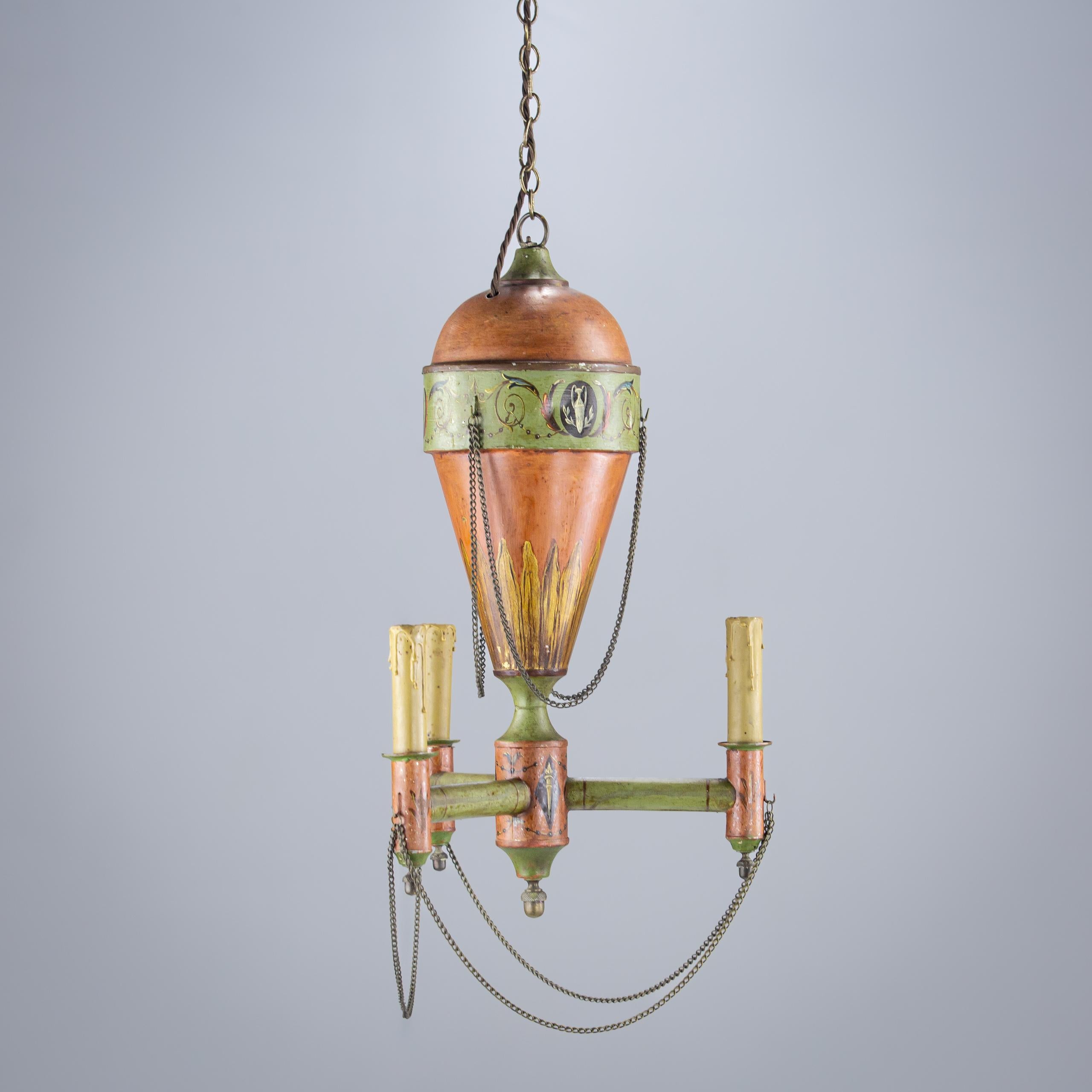 Tole Piente Chandelier in the form of a Hot Air Balloon. Crown Line  and drop line as patinated brass chain. original paint.

France, Circa 1930.

Rewired using antique style flex cord.