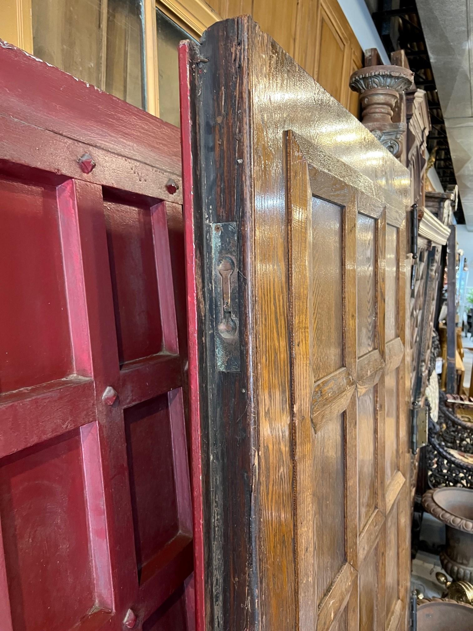 Early 20th Century Pair of Antique Wooden Doors with Panels For Sale 7