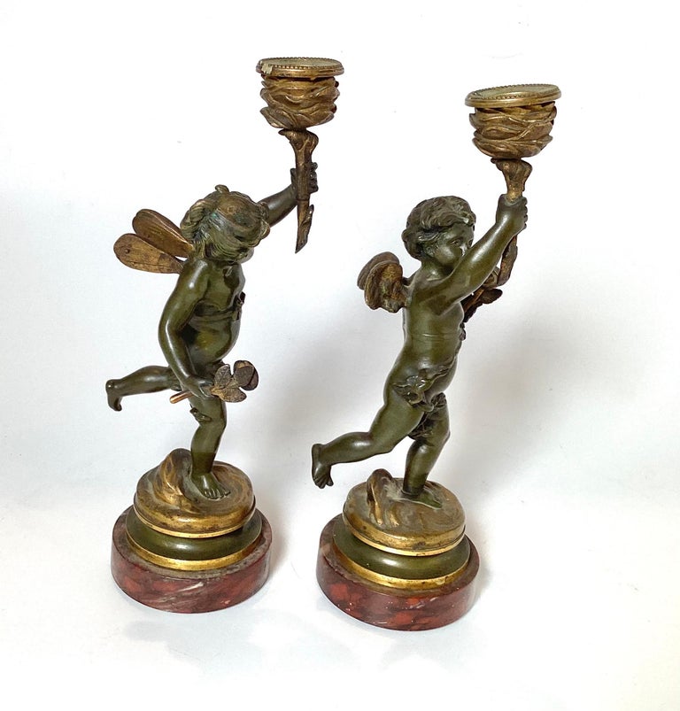 Early 20th Century Pair Of Bronze Cherub Candlesticks For Sale at 1stDibs