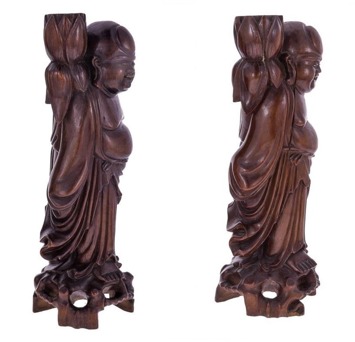 Chinese Early 20th Century Pair of Carved Tamarind Wood Buddha Candleholders For Sale