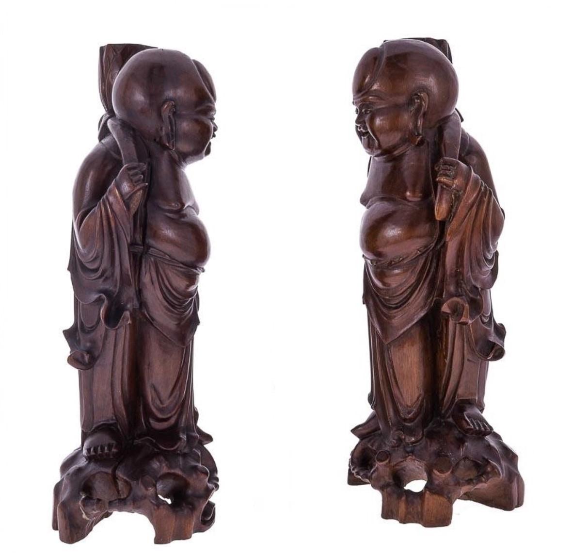 Early 20th Century Pair of Carved Tamarind Wood Buddha Candleholders In Good Condition For Sale In Frankfurt am Main, DE