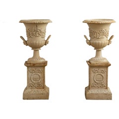 Early 20th Century Pair of Cast Iron Garden Urns on Plinths