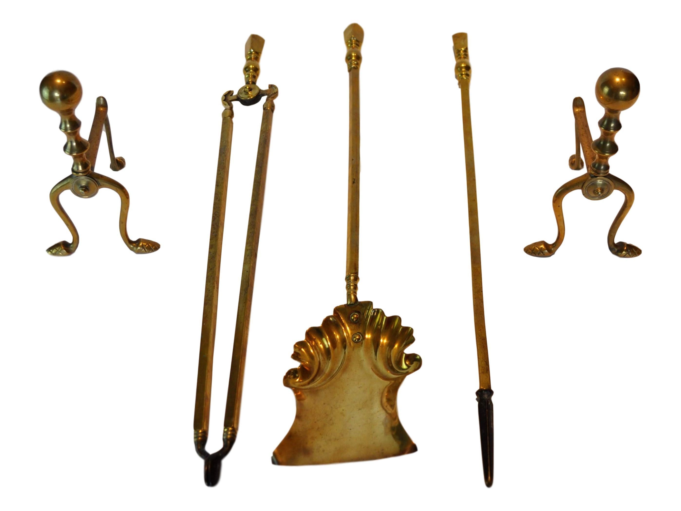 Classic pair of English brass andirons and fire tool set, English circa early 20th century.