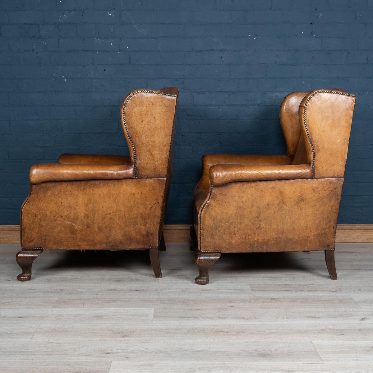 Early 20th Century Pair of Dutch Leather Wing Back Armchairs, circa 1900 In Good Condition In Royal Tunbridge Wells, Kent