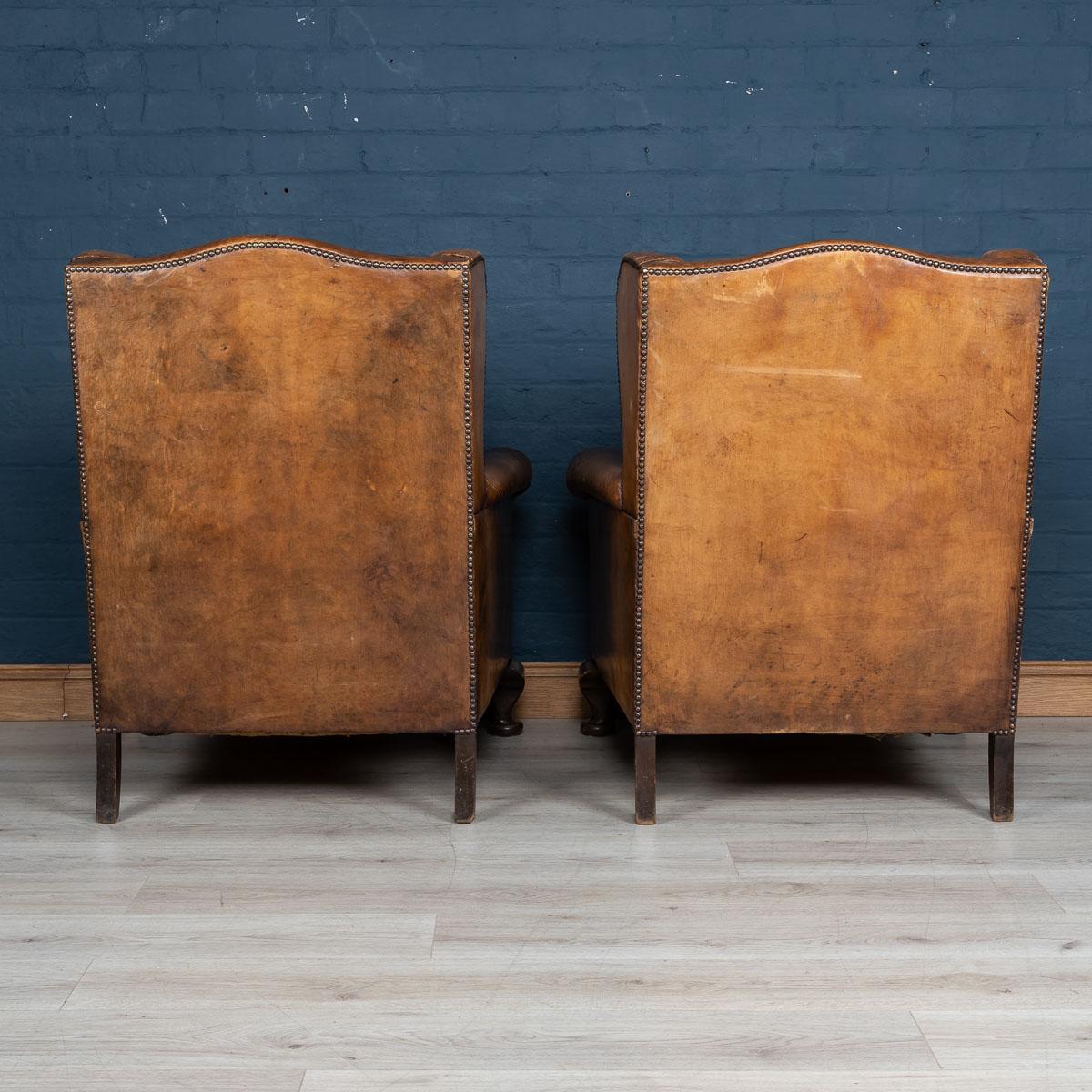 Early 20th Century Pair of Dutch Leather Wing Back Armchairs, circa 1900 1