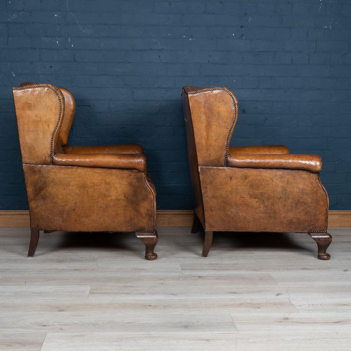 Early 20th Century Pair of Dutch Leather Wing Back Armchairs, circa 1900 2