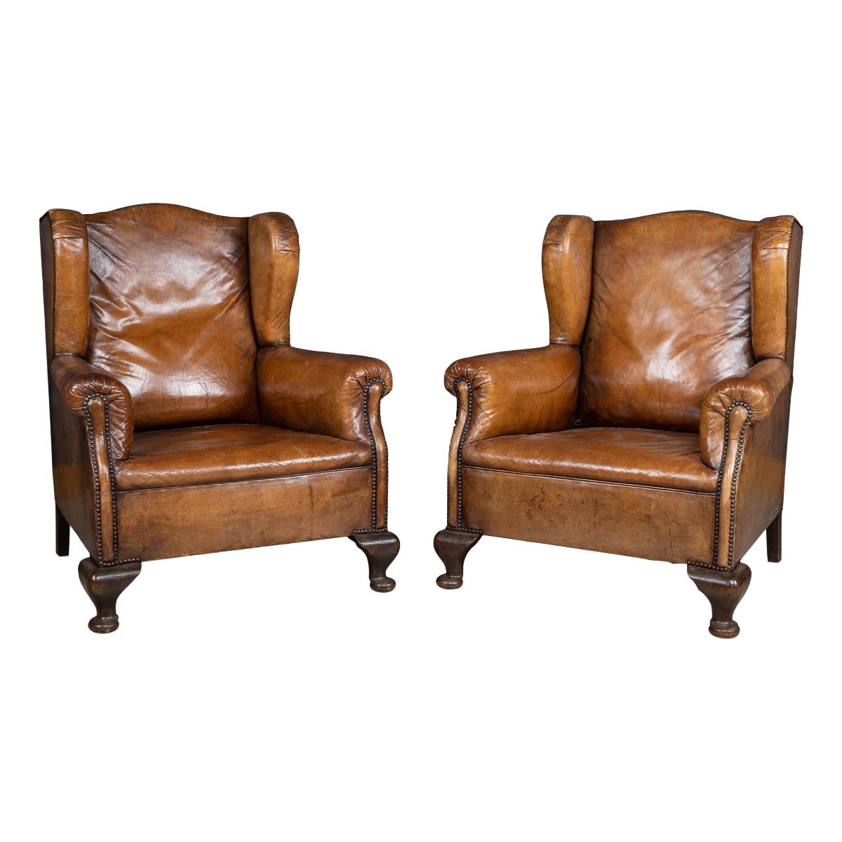 Early 20th Century Pair of Dutch Leather Wing Back Armchairs, circa 1900