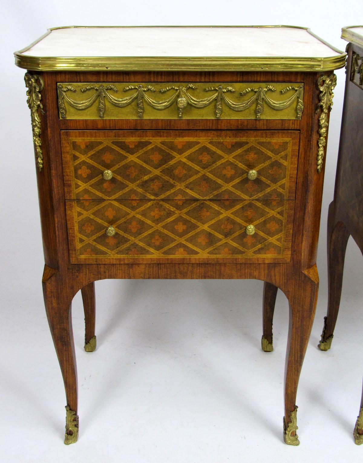 Exquisite pair of French Transitional commodes with hand painted diamond shaped design drawer fronts, bronze mounted top drawers, and onyx tops, from a 40,000SF North Dallas mansion.