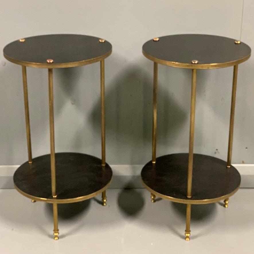 Fantastic pair of Art Deco French black ebonized and brass two tier lamp tables or étagère, circa 1920 and in lovely original condition.
Great size pair of tables for a pair of lamps as sofa end tables perhaps, or they could also work well as a