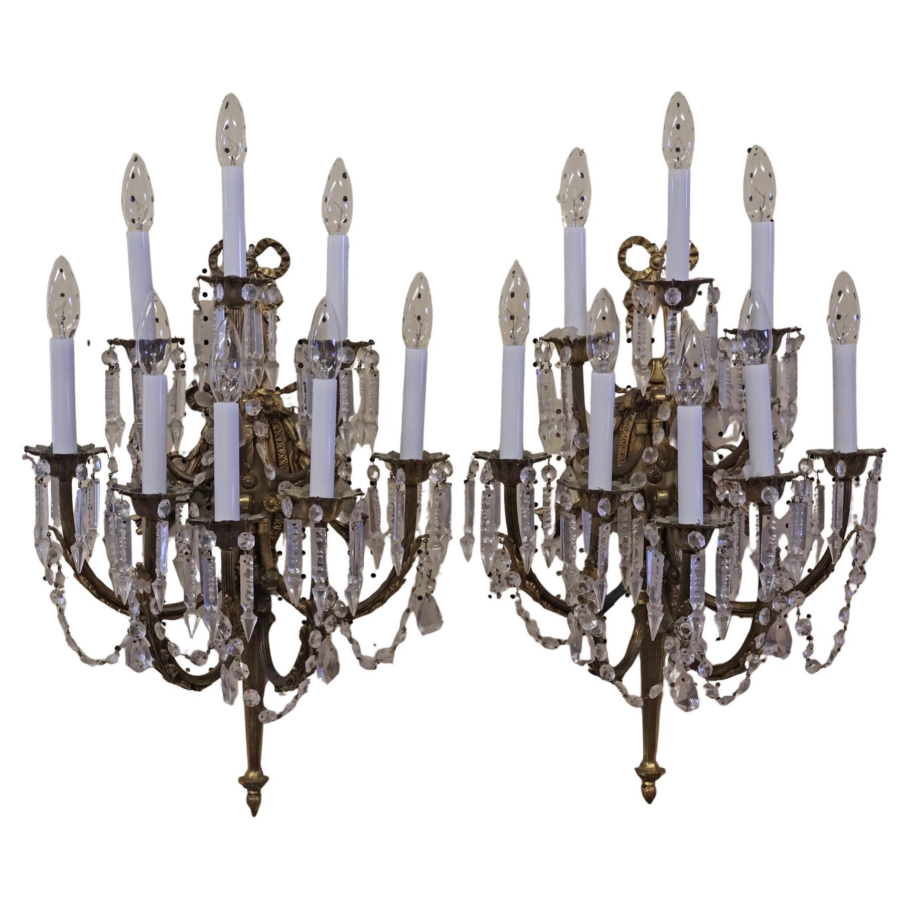 Early 20th Century Pair of French Louis XVI Style Brass & Crystal Sconces