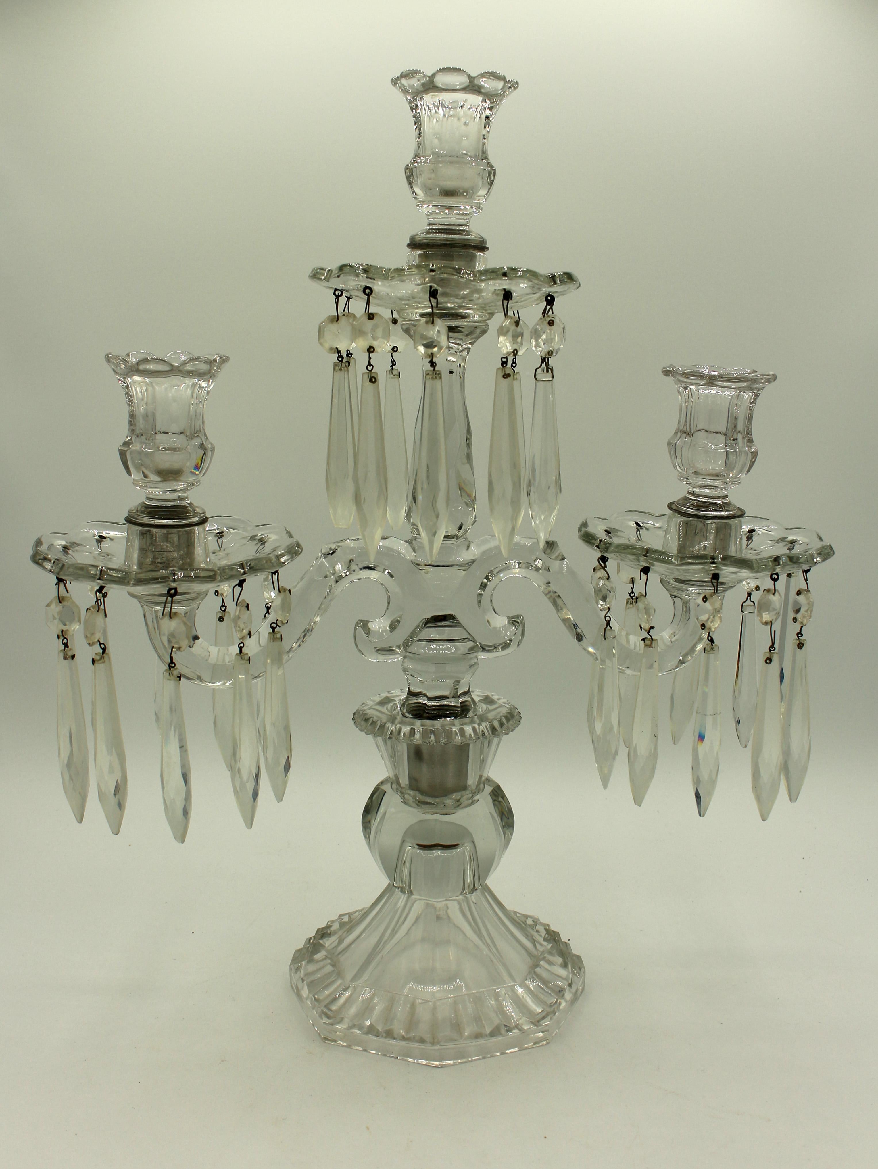 Early 20th century pair of 3-light cut glass candelabras, attributed to Heisey. While the arms are 