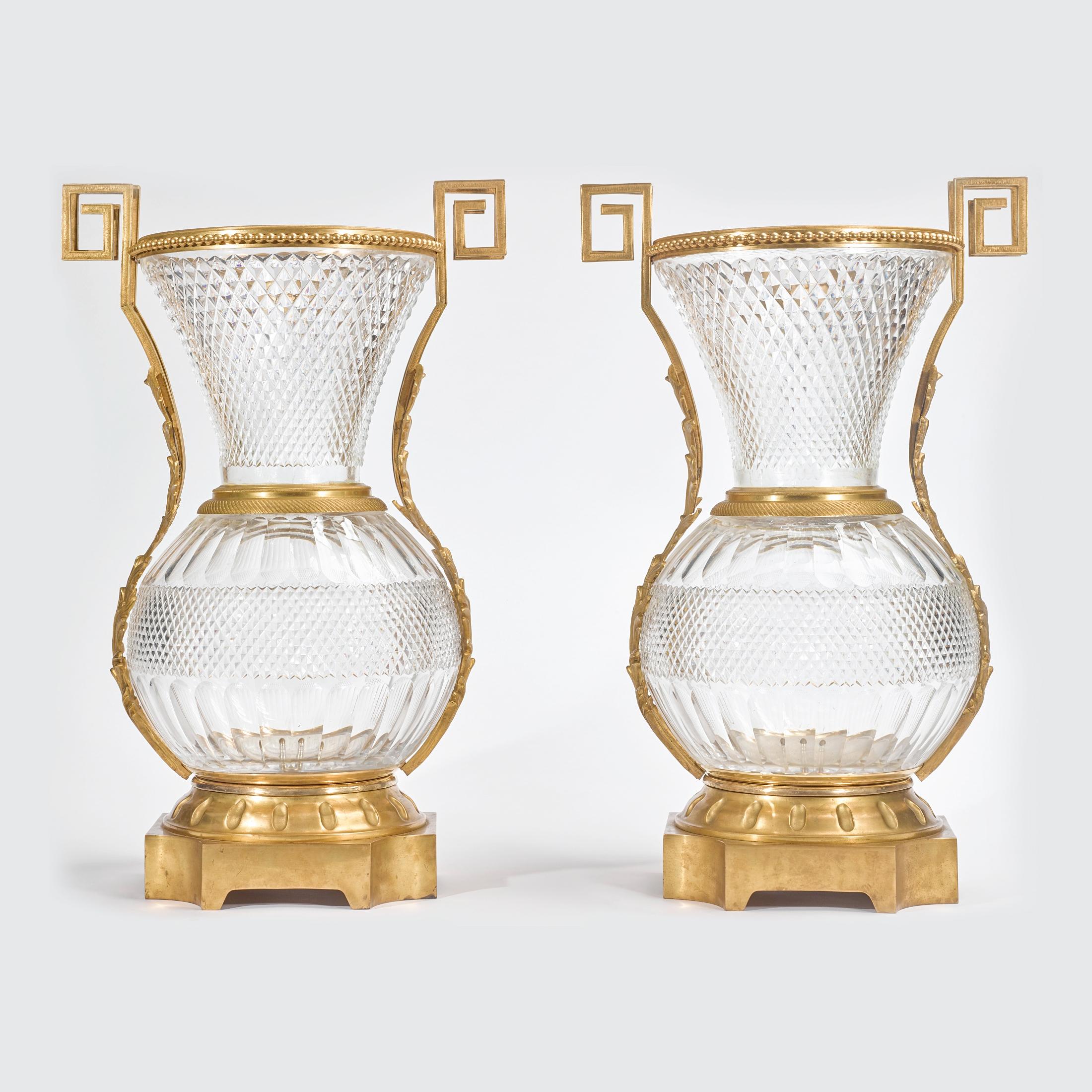 A Fine Quality Pair of Very Large French Ormolu-Mounted Cut Crystal Vases

Origin: French
Date: Early 20th century
Dimension: 28 in. x 17 1/2 in.