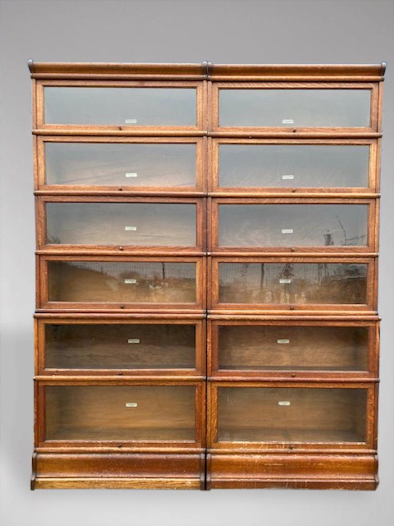 Polished Early 20th Century Pair of Solid Oak and Brass Globe Wernicke Bookcases