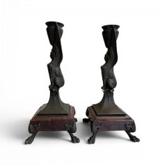 Early 20th Century Pair of Spelter Egyptian Revival Sphinx Motif Candlesticks