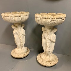 Early 20th Century Pair of White Washed Stone Garden Urns with Figure Columns