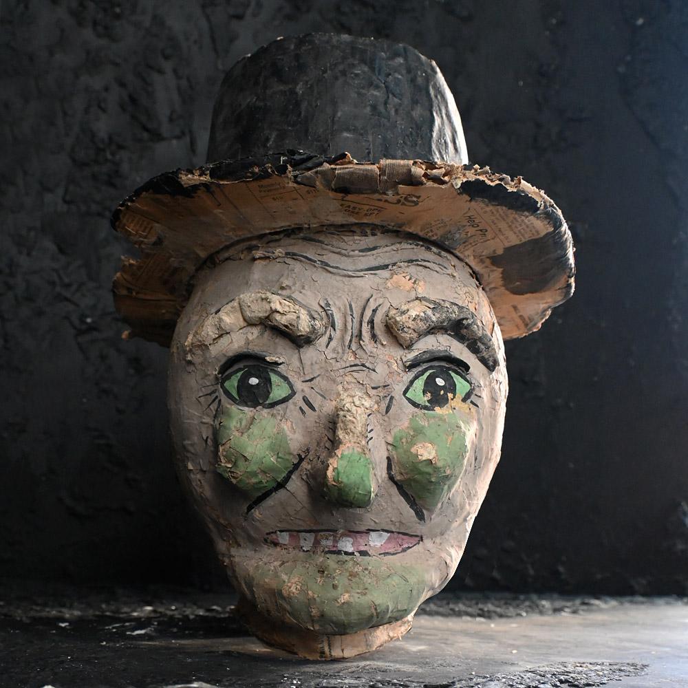 Early 20th century papier Mache American carnival head 

A hand crafted early 20th century papier Mache American carnival head. This unusual yet fun figure head of a witch, is constructed using layers of old newspaper. With hand painted detail,