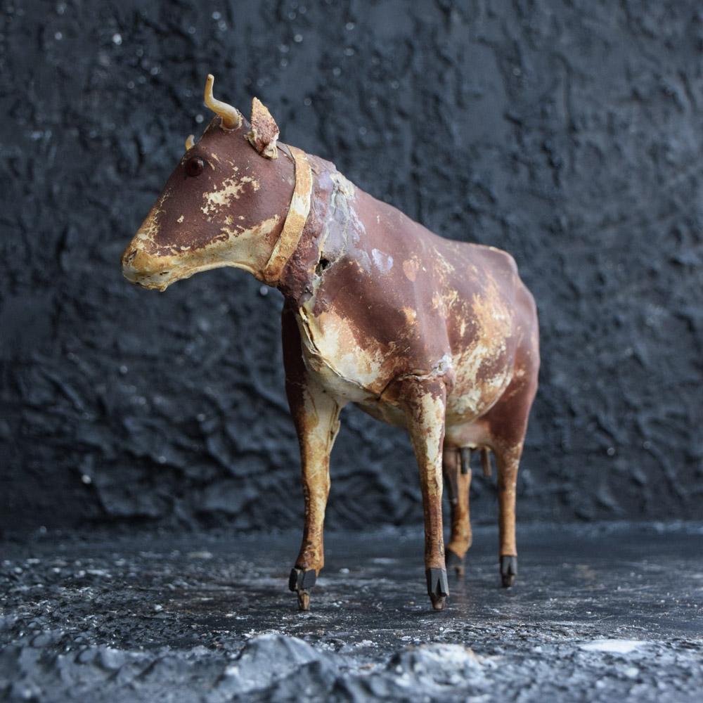 Hand-Crafted Early 20th Century Papier Mâché Childs Milking Cow Toy For Sale