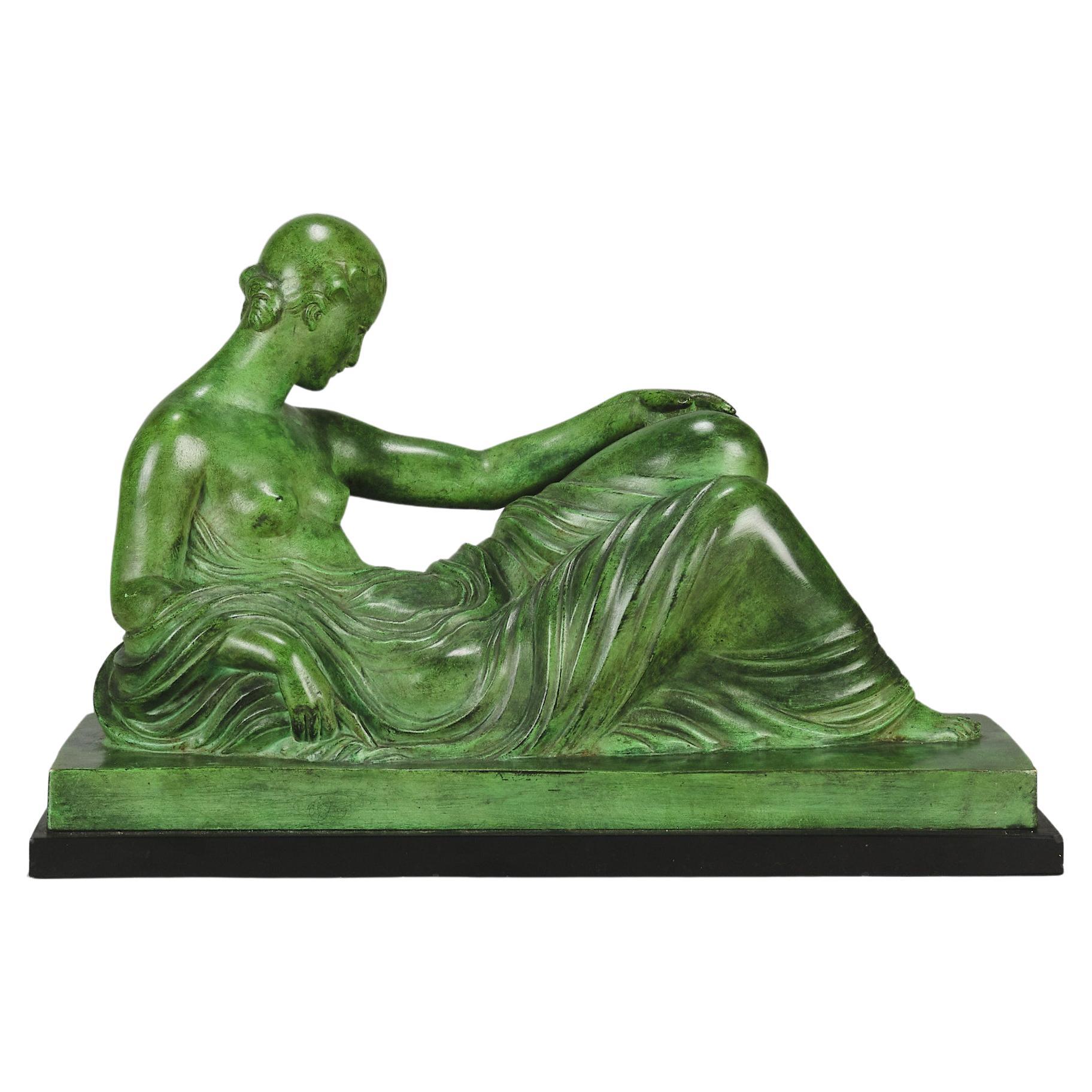 Early 20th Century Patinated Bronze Entitled "Femme Allongée" by Gaston Béguin For Sale