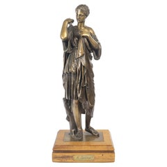 Early 20th-Century Patinated Bronze Sculpture of Diana on a Wooden Base.