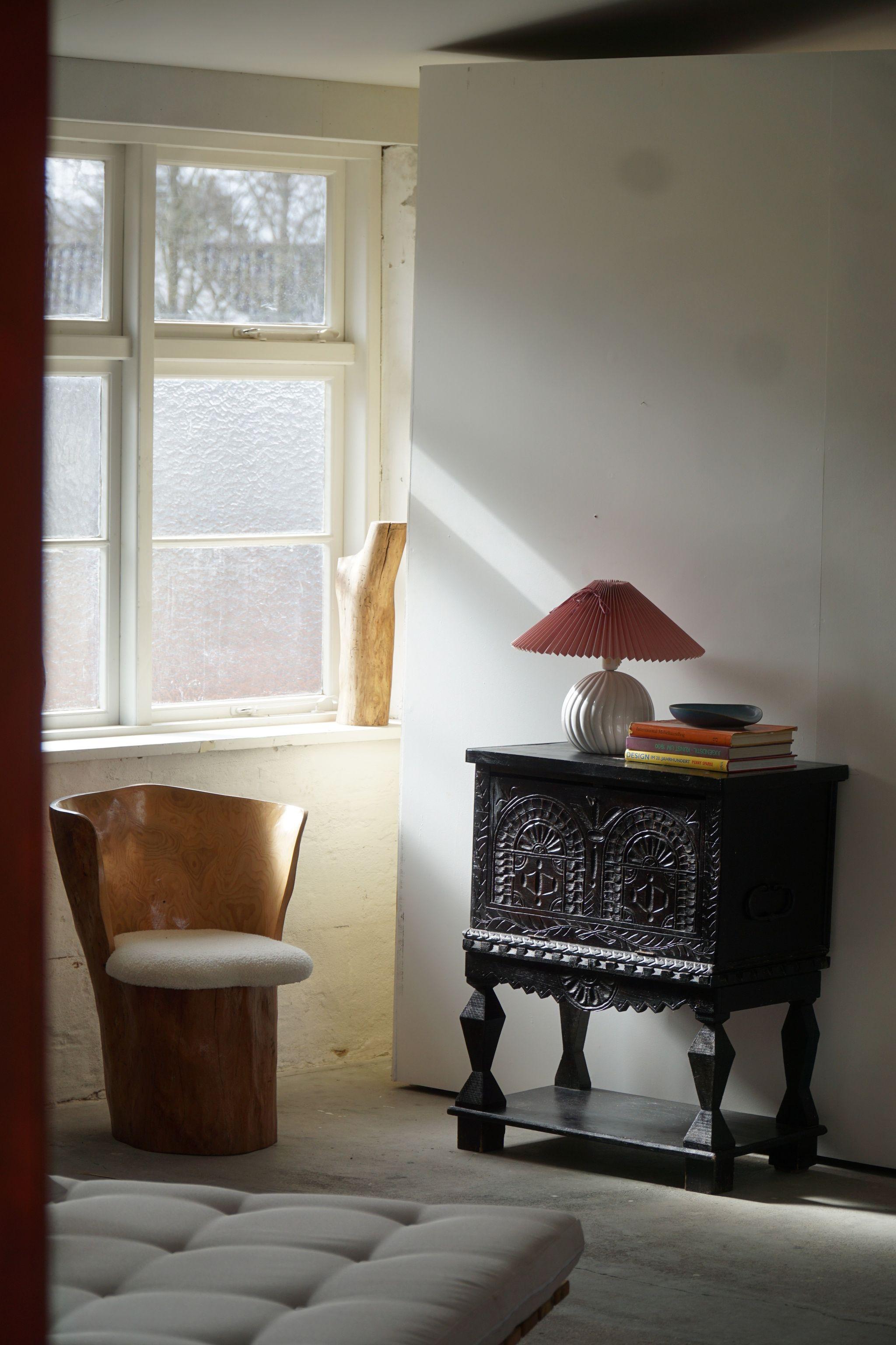 Fine chest made in solid oak, hand crafted by a Danish Carpenter in 1920s. 

A beautiful baroque / wabi sabi style brutalist object with a fine patina. Decorative and well suited for the modern interior.

