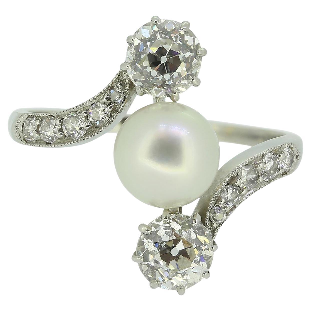 Early 20th Century Pearl and Diamond Three-Stone Ring