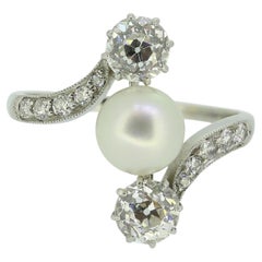 Early 20th Century Pearl and Diamond Three-Stone Ring