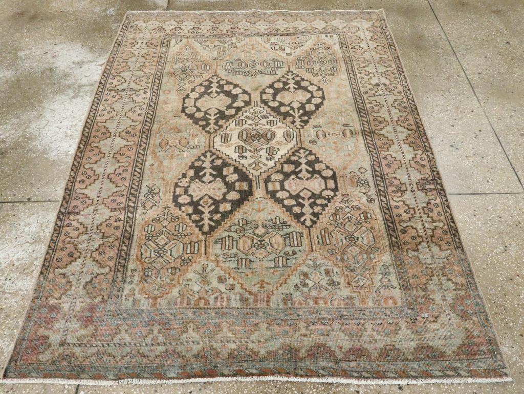 An antique Persian Afshar accent rug handmade during the Early 20th century.

Measures: 4' 7