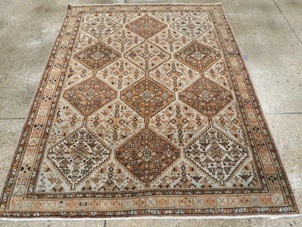 An antique Persian Afshar accent rug handmade during the Early 20th century.

Measures: 4' 9