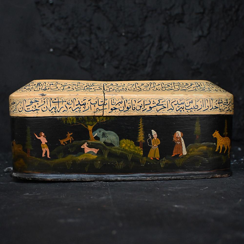 Early 20th century Persian hand crafted box 

A hand painted hunting scene at play, covered in wild animals including deers, cats, horses, moneys, tigers, elephants and goats. This large box is completely hand painted with an decorative edge motif