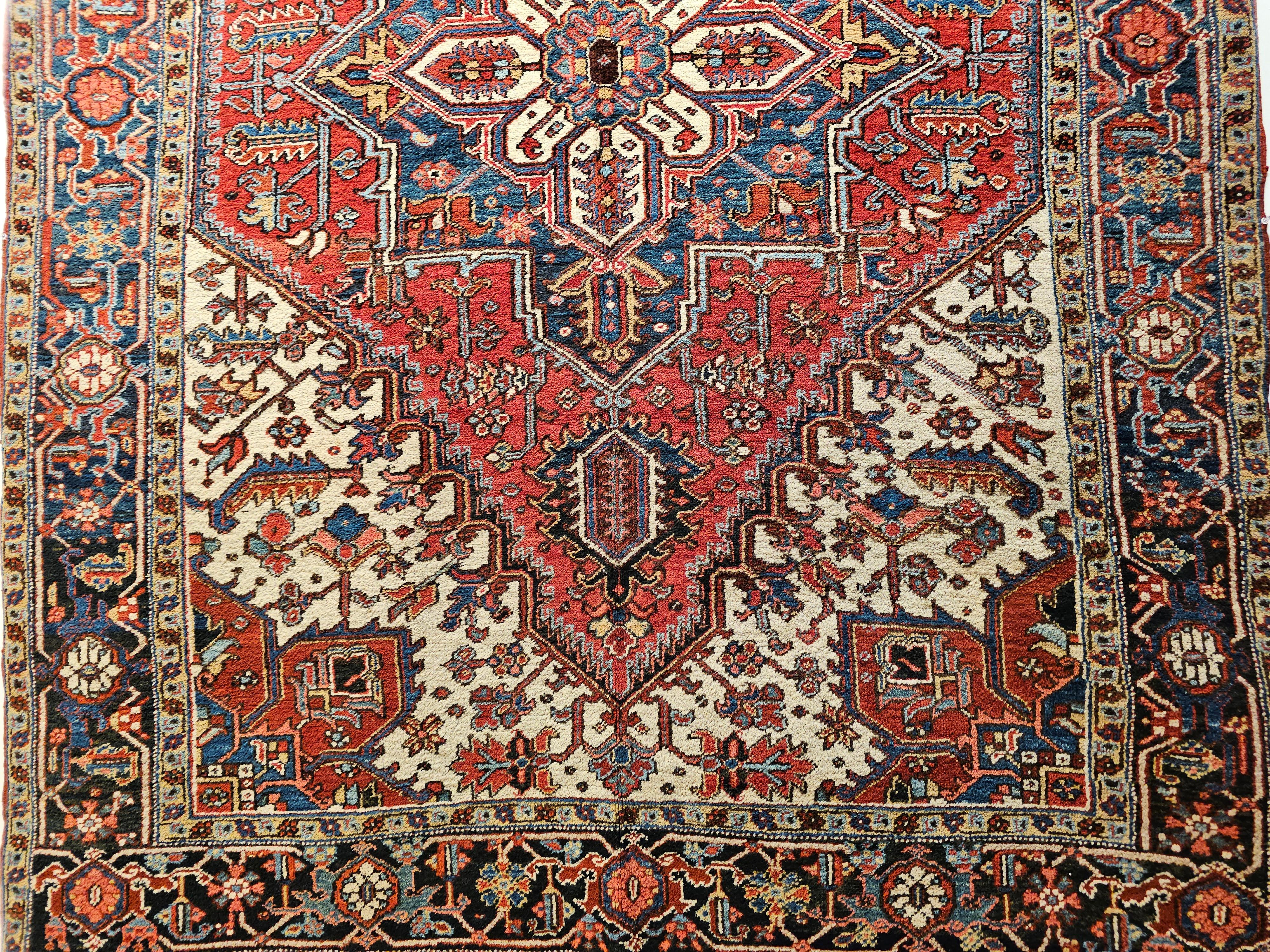 Hand-Knotted Early 20th Century Persian Heriz in Red, Navy, French Blue, Ivory, Pink, Yellow For Sale