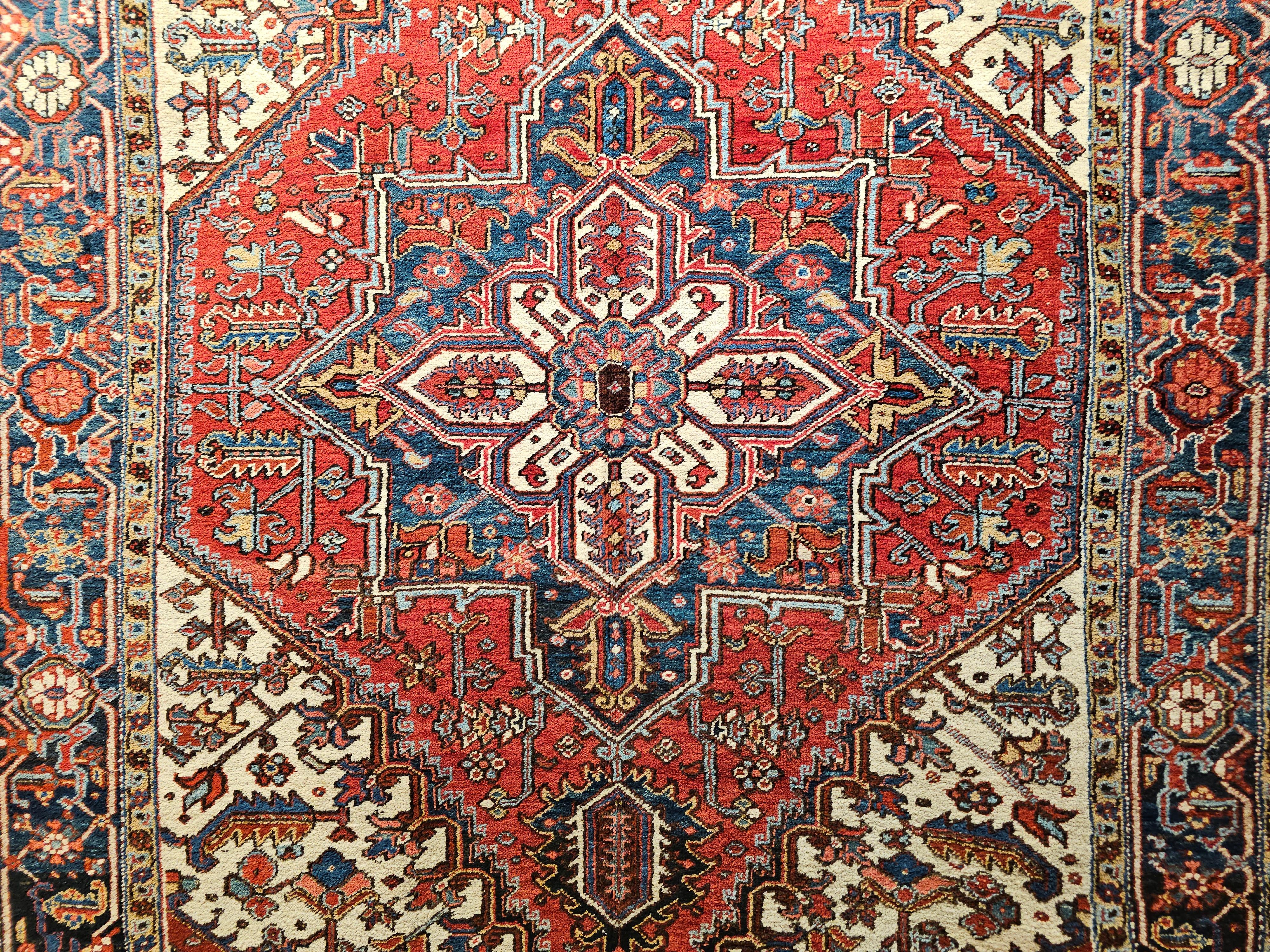 Early 20th Century Persian Heriz in Red, Navy, French Blue, Ivory, Pink, Yellow In Good Condition For Sale In Barrington, IL