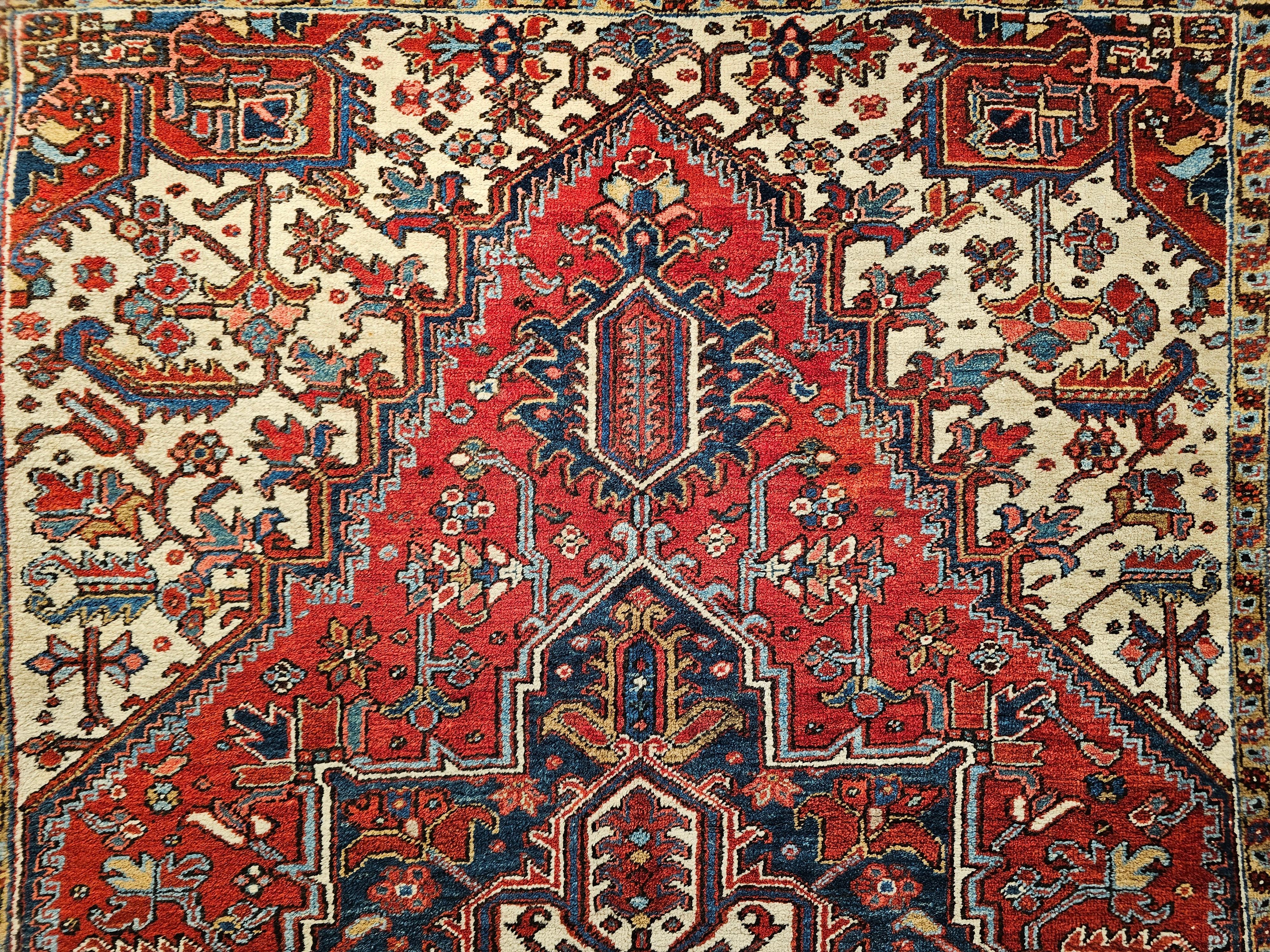 Wool Early 20th Century Persian Heriz in Red, Navy, French Blue, Ivory, Pink, Yellow For Sale