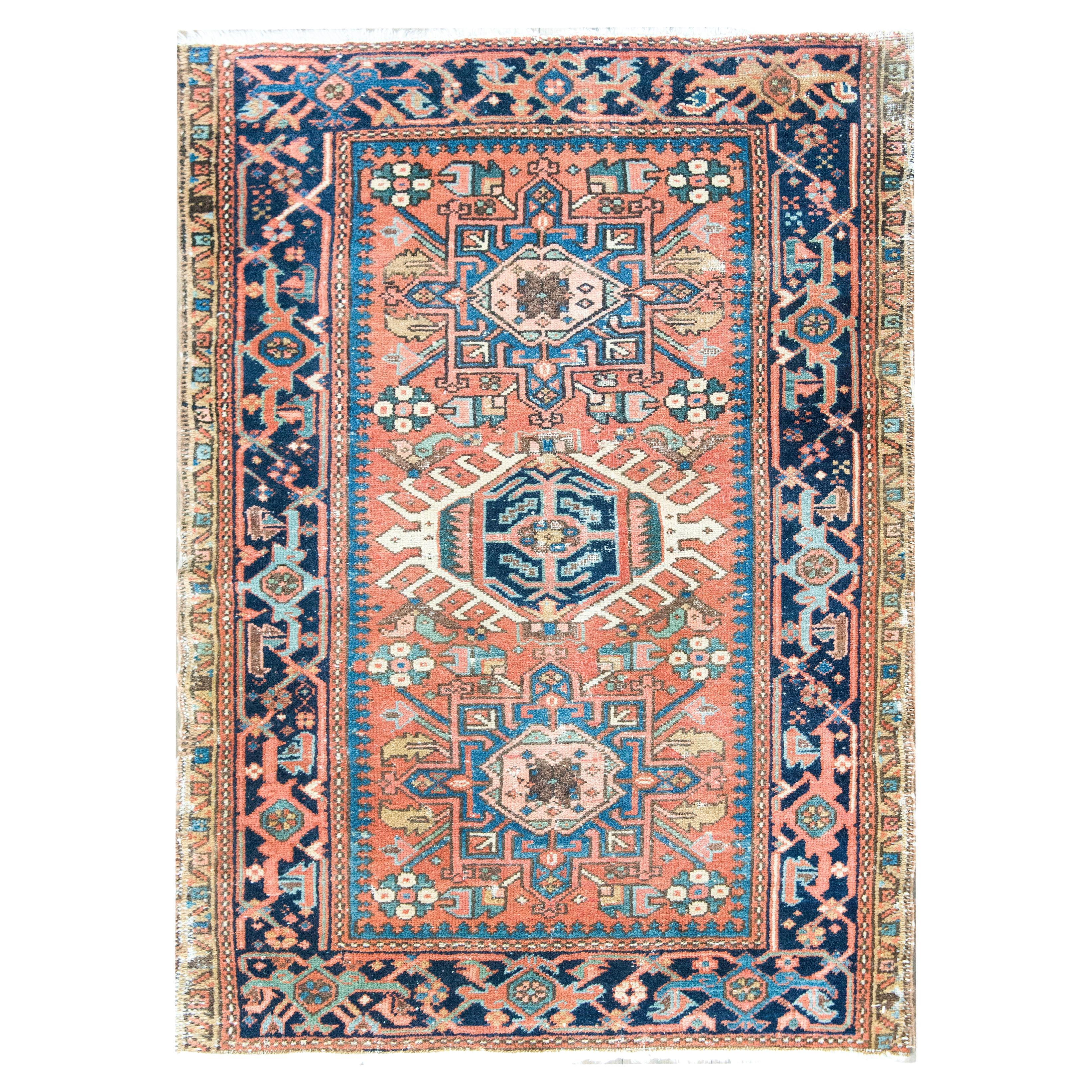 Tapis persan Heriz du début du 20e siècle en vente